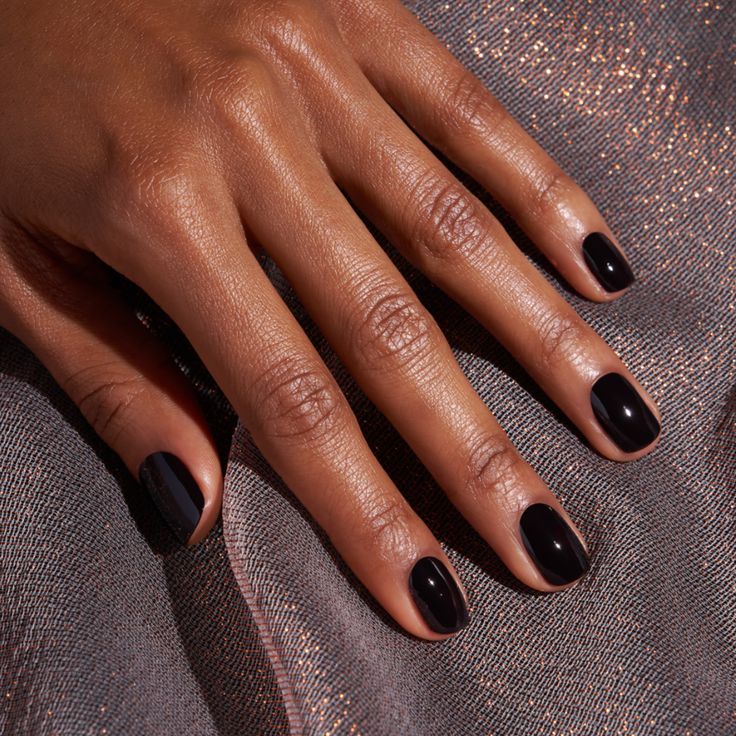 Sleek and Sophisticated Glossy Black Nail Design for Any Occasion