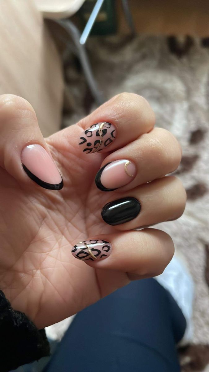 Chic French Tip Nail Design with Pink, Black, and Leopard Print Accents