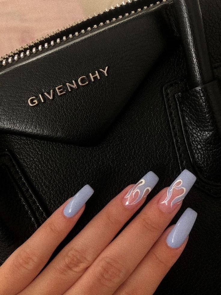 Elegant Long Lavender Nails with Intricate Swirls Complement Chic Black Handbag.