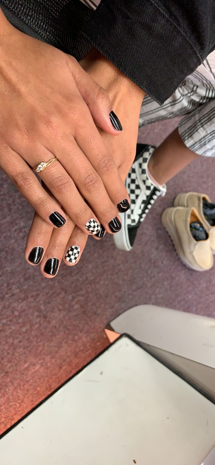 Chic Black and White Nail Design with Striking Patterns for a Modern Aesthetic.