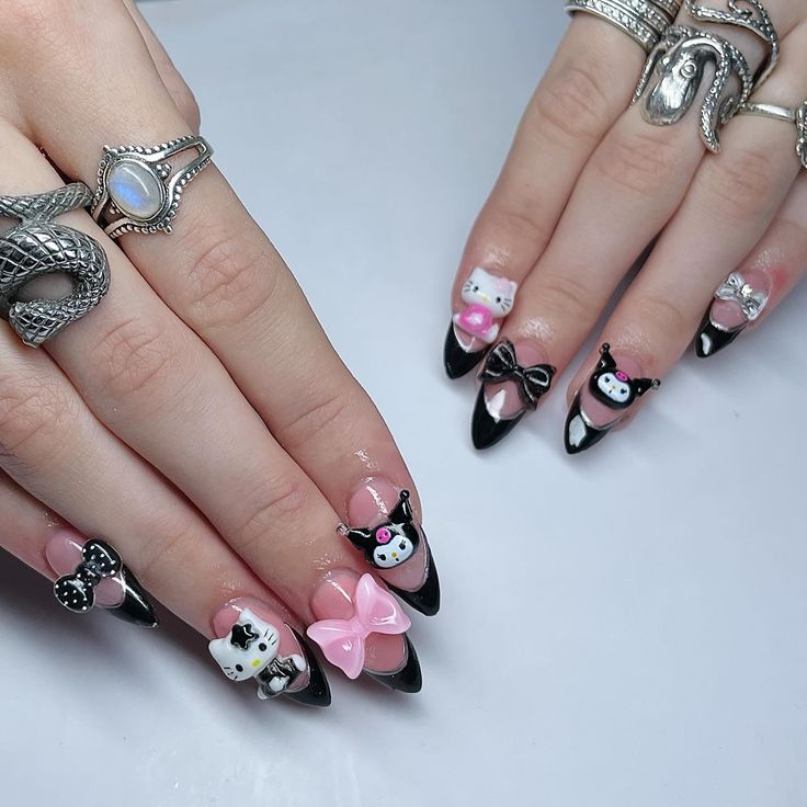 Whimsical Nail Art: Striking Contrast with Playful Designs and Dramatic Shapes.