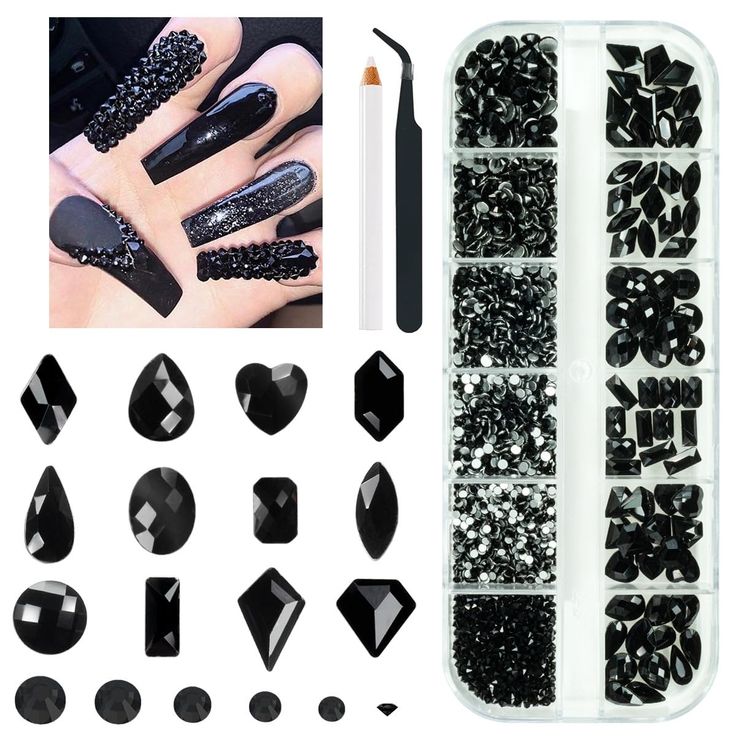 Elegant Black Nail Designs: A Luxurious Blend of Glossy Finishes and Intricate Embellishments.