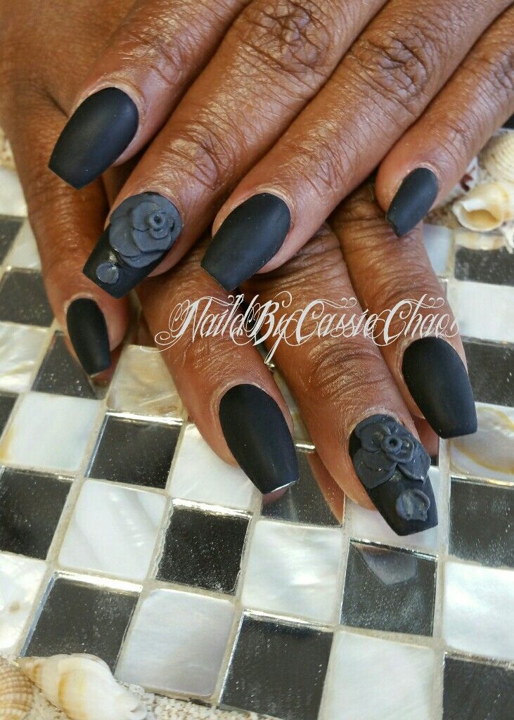 Sophisticated Floral Matte Black Nails: A Bold, Artistic Statement.