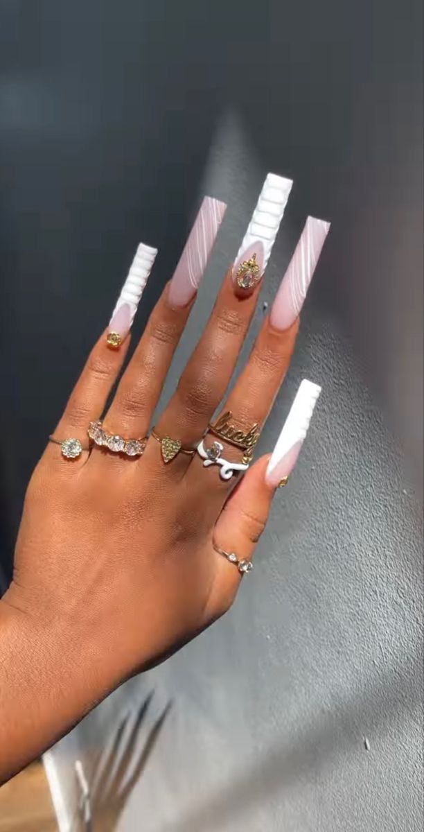 Elegant Long Nails with Glossy White and Pink Hues, Artistic Swirls, and Gem Accents.