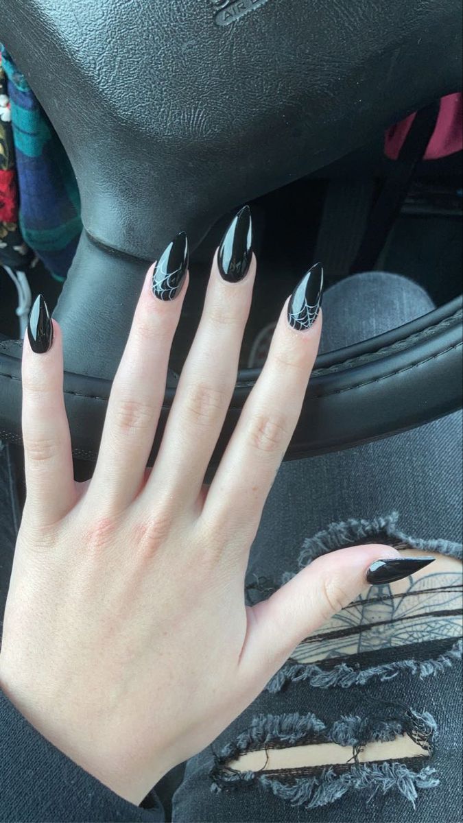 Bold Black Spider Web Nail Design: Edgy Elegance for Halloween and Unique Style.