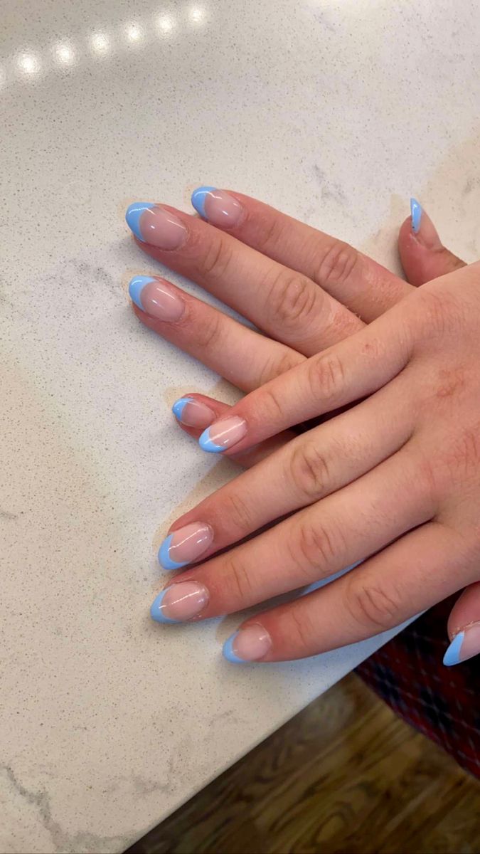 Chic French Manicure with Refreshing Soft Blue Tips