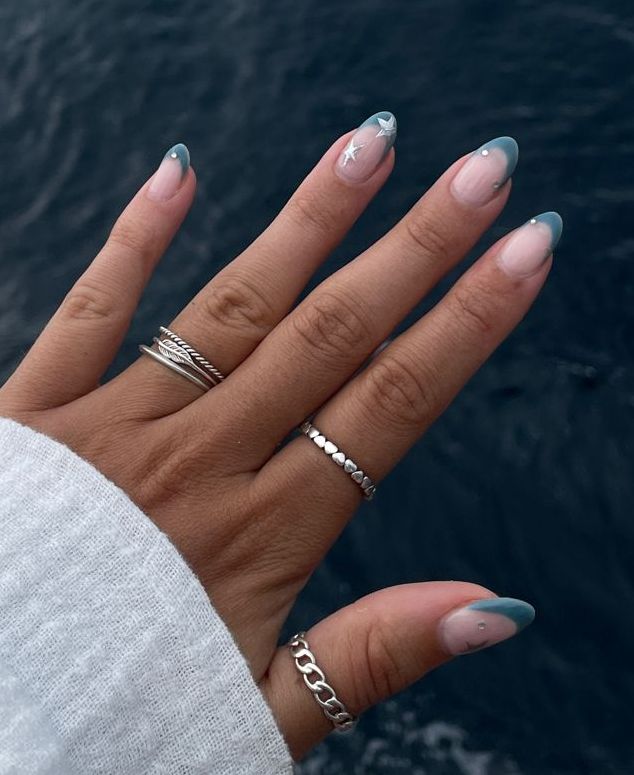 Elegant Ombre Nail Design with Whimsical White Accents