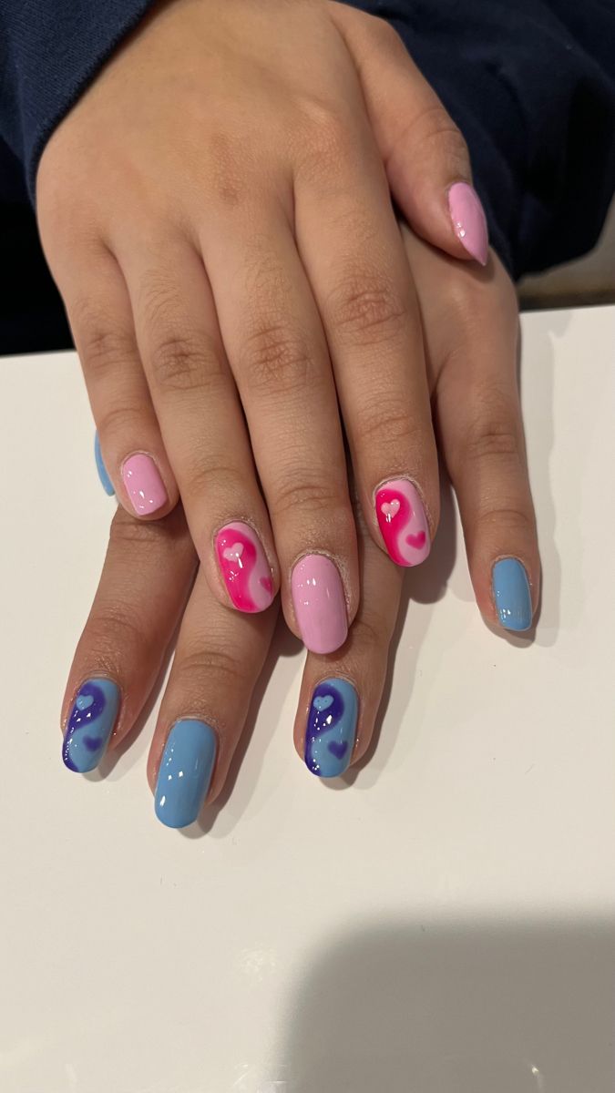 Playful Pink and Blue Swirl Nail Designs for Unique Self-Expression.