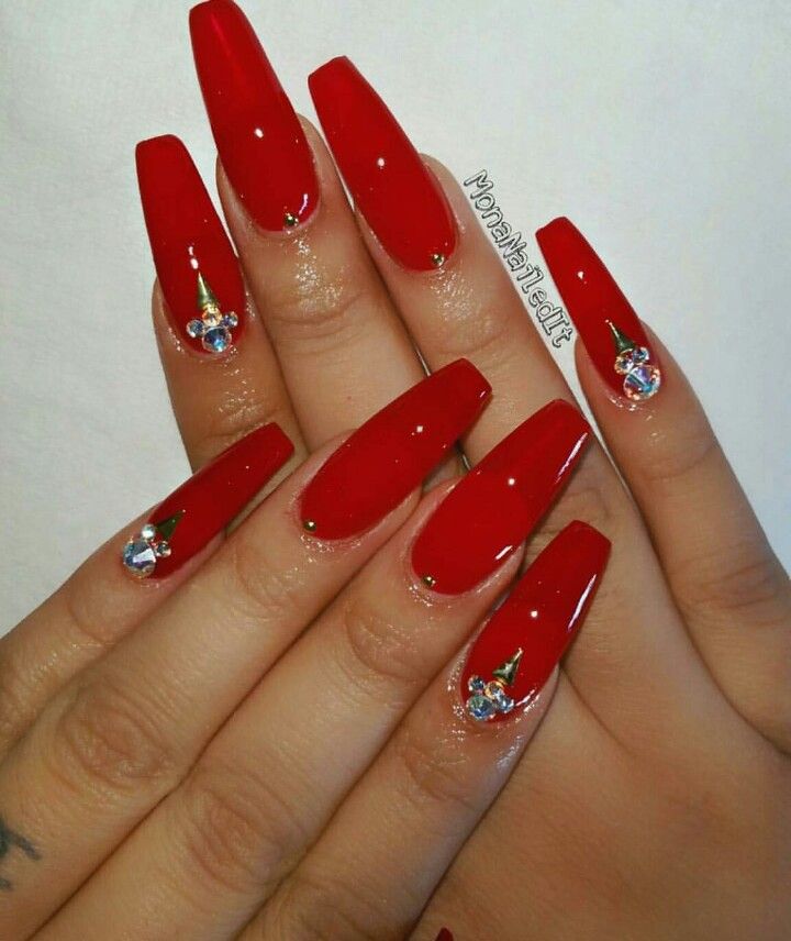 Striking Bold Red Glossy Nails with Elegant Gem Embellishments and Sophisticated Square Shape.