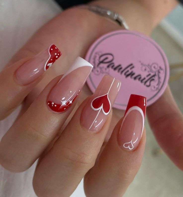 Chic Valentine's Nail Art: Romantic Red and White Acrylic Tips with Hearts and Polka Dots