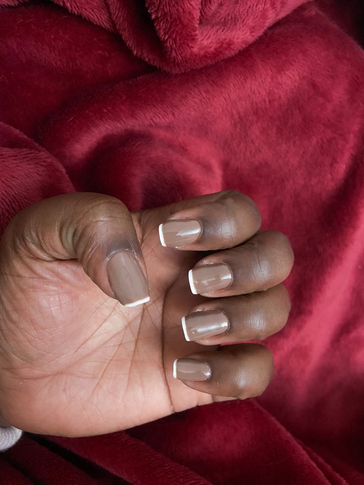 Chic Nude Base with Elegant White French Tips for Sophisticated Nail Design