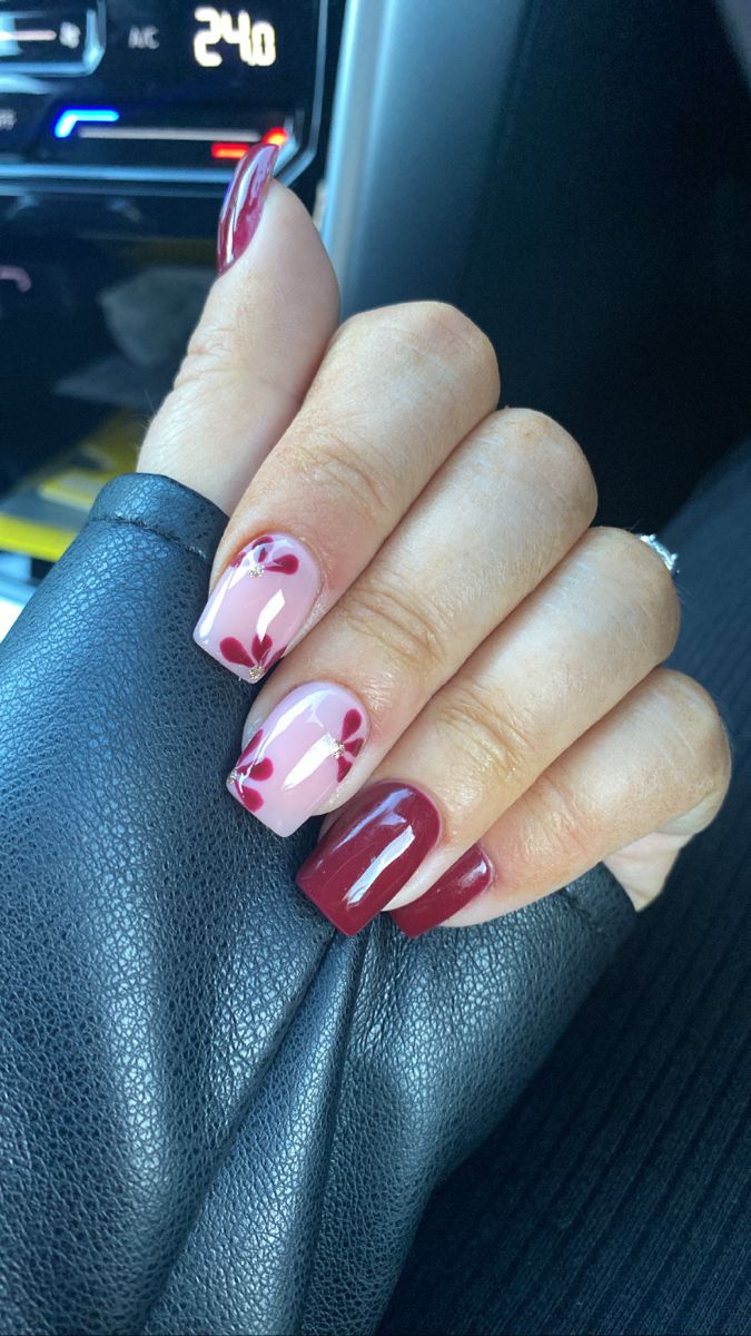 Chic Nail Design: Deep Burgundy and Soft Pink with Rich Red Floral Accents