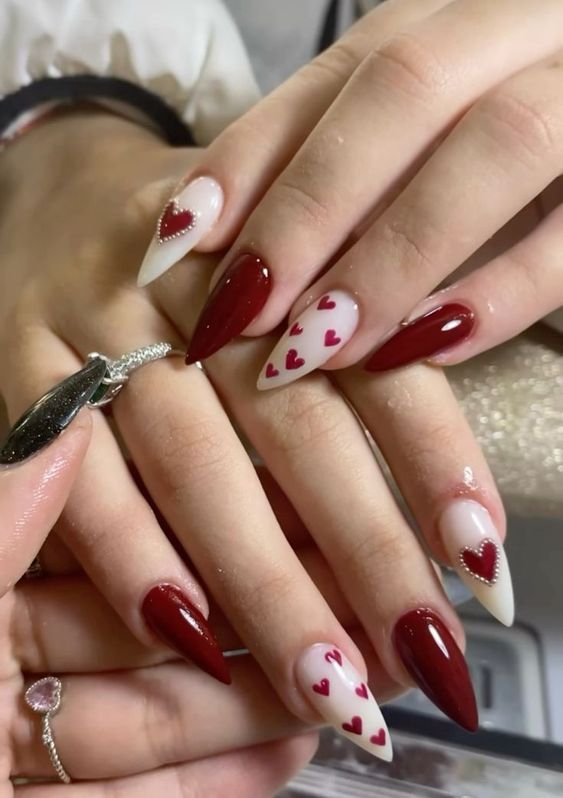 Sophisticated Heart-Themed Nail Design in Deep Red and Soft White for Romantic Occasions