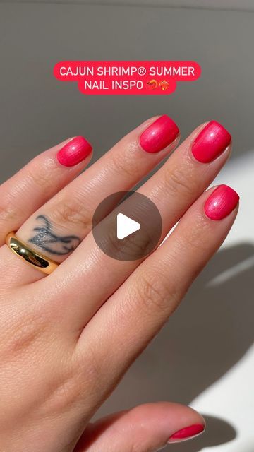 Playful Summer Nails: Striking Pink with Glossy Shine and Gold Accents