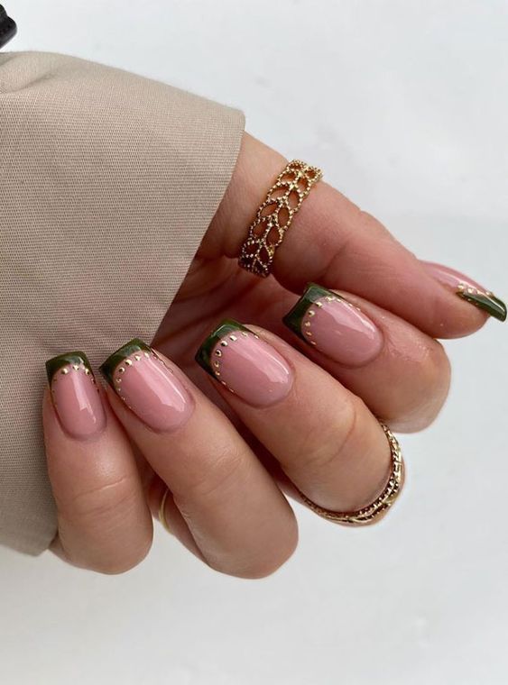 Chic Nail Design: Soft Pink and Deep Green with Elegant Gold Accents