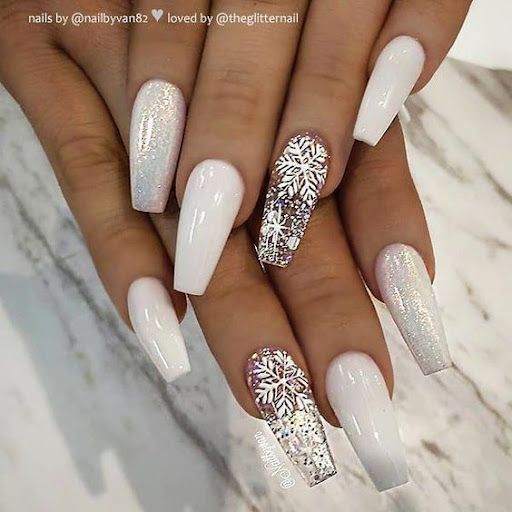 Glamorous Winter-Inspired Nail Design with Glossy White and Holographic Finishes