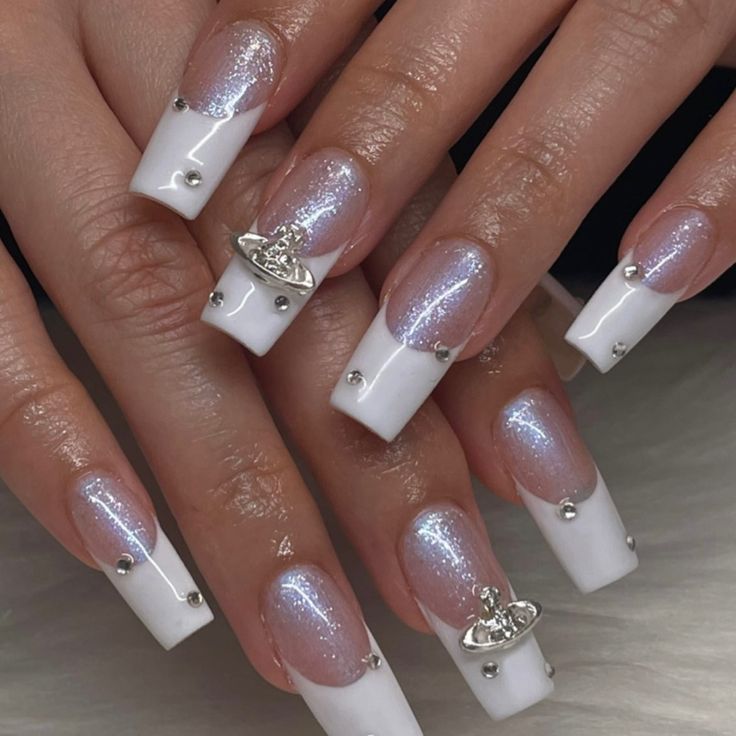 Sophisticated Shimmering Gradient Nail Design with Glossy Finish and Elegant Silver Accents.