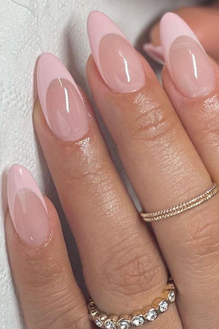 Elegant Almond-Shaped Nails with Soft Pink Tones and Glossy Finish