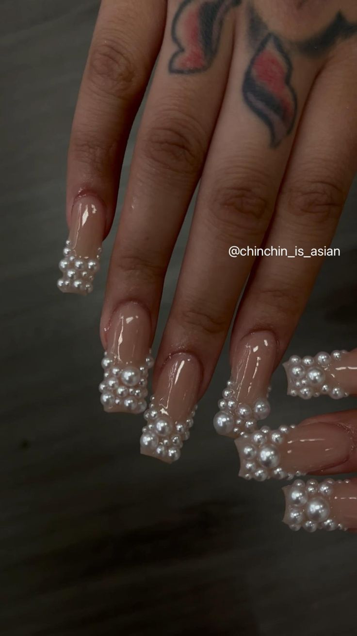 Luxurious Pearl-Adorned Square Nail Design with Soft Nude Base