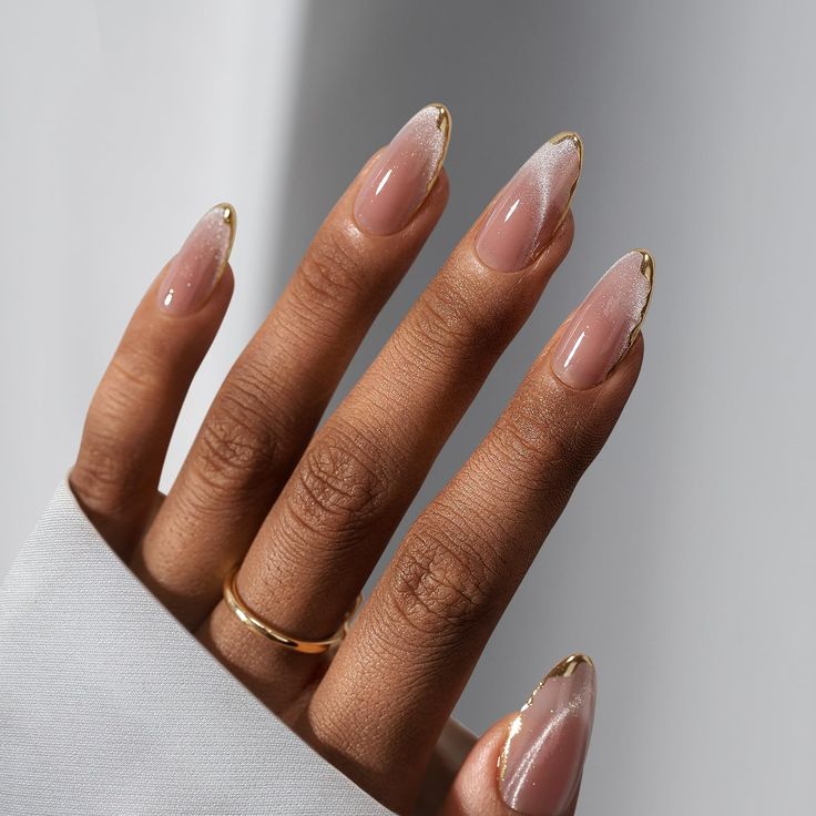 Sophisticated Almond-Shaped Ombre Nails with Delicate Gold Accents