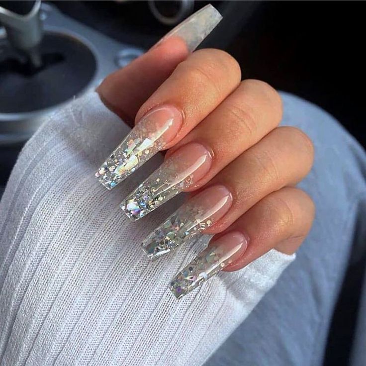 Glamorous Glittery Ombre Nails with Striking Clear and Silver Finishes.