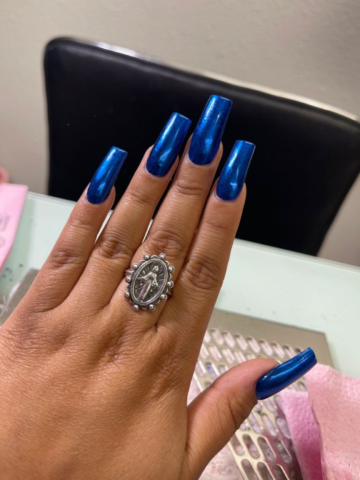 Bold and Elegant: Striking Metallic Blue Nails with Glossy Finish and Tapered Shape