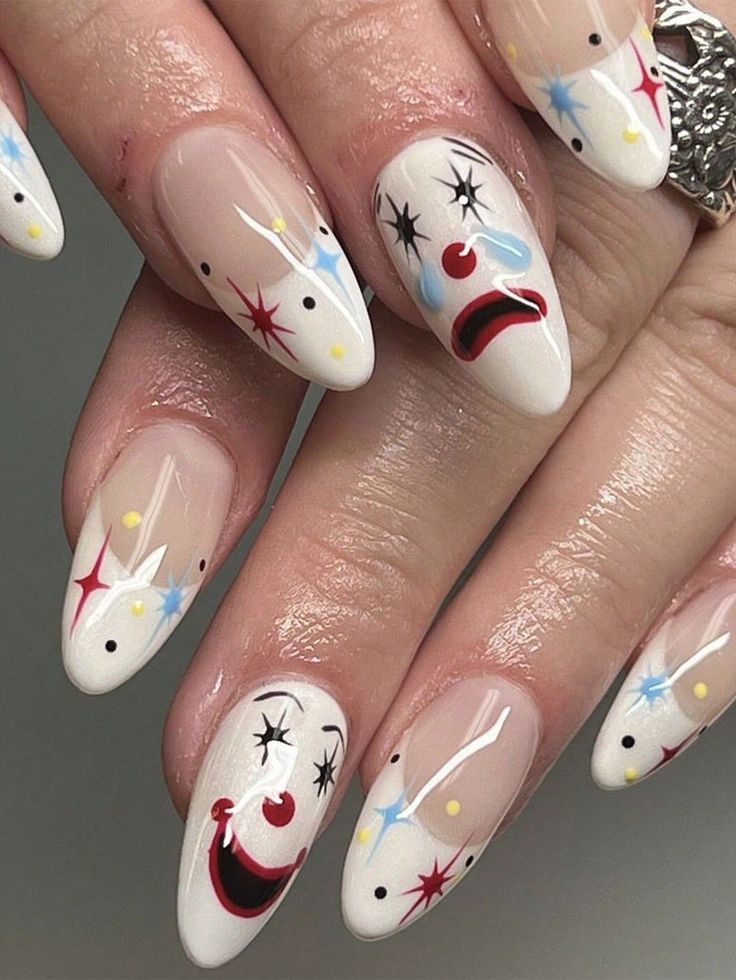 Playful Clown-Inspired Nail Design with Unique Characters and Whimsical Accents.