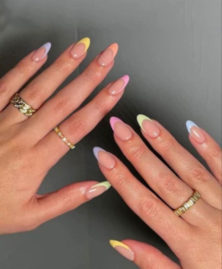 Trendy Colorful Pastel Nail Design with Elegant Tips and Chic Rings.