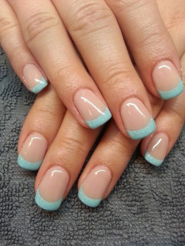 Chic French Manicure with Shimmering Pastel Blue Tips for Versatile Elegance.