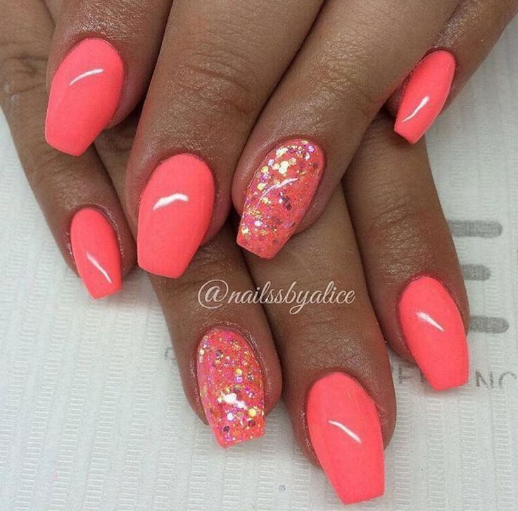 Lively Coral Nail Design with Solid and Glitter Accents for a Playful Summer Look.