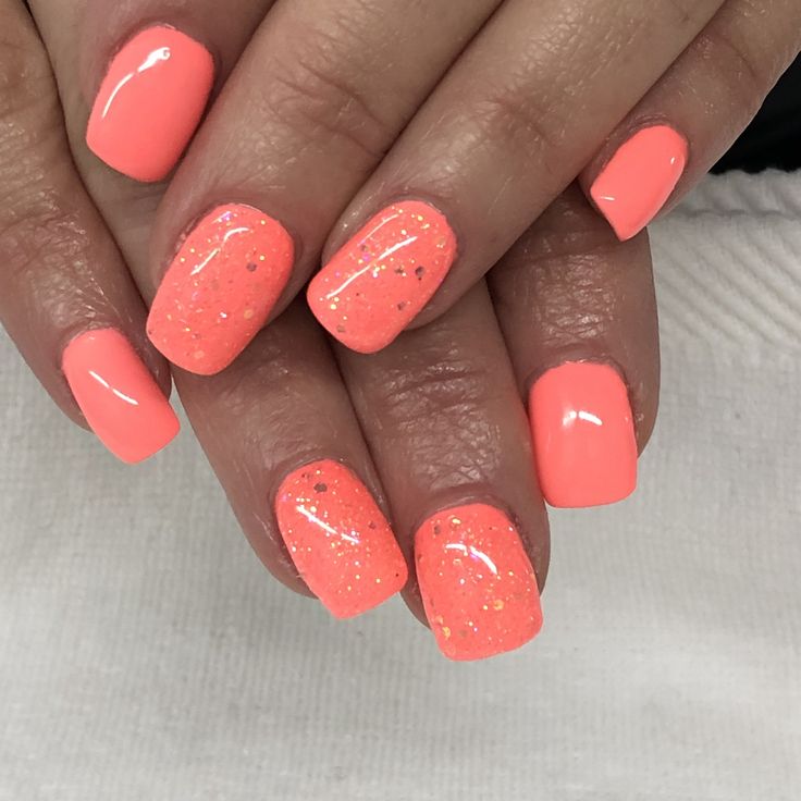 Chic Summer Coral Nail Design: Playful Mix of Solid and Glitter Finishes