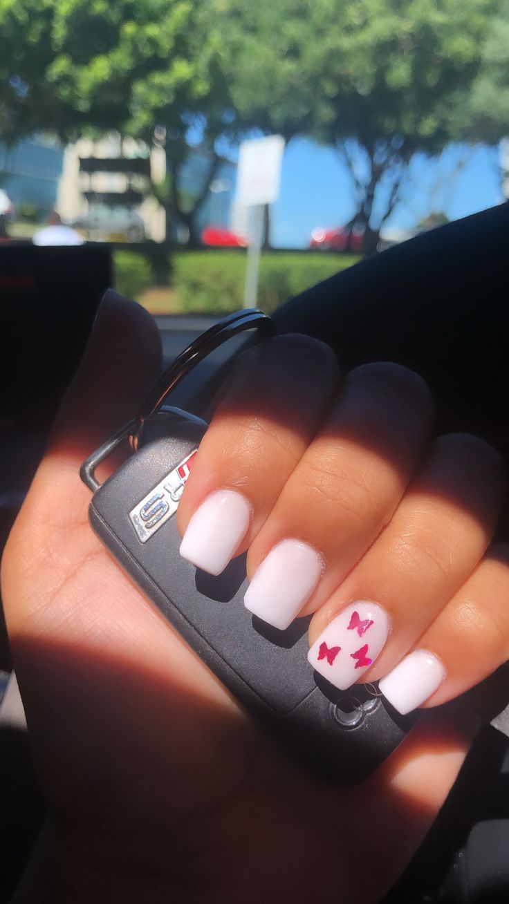 Chic White Nail Design with Trendy Red Accents for Every Occasion