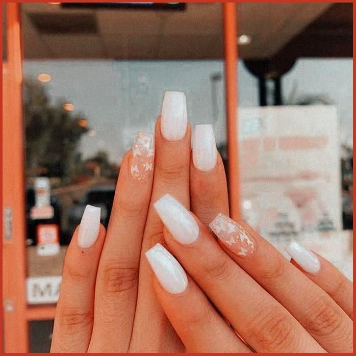 Chic Glossy White Nail Design with Floral Accents and Sophisticated Square Shape