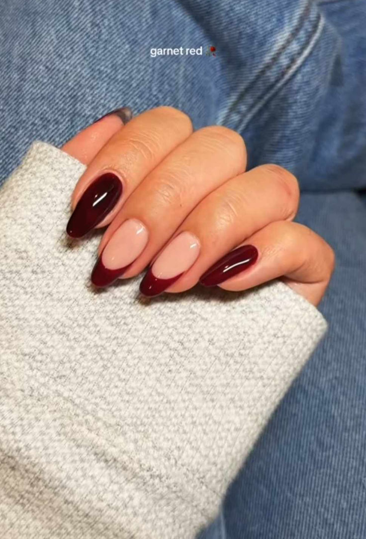 Sophisticated Pointed Nail Design with Garnet Red and Nude Shades.