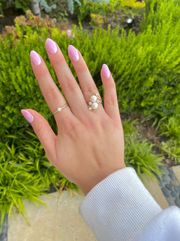 Elegant Pastel Pink Nails with Rings for a Fresh, Feminine Aesthetic.