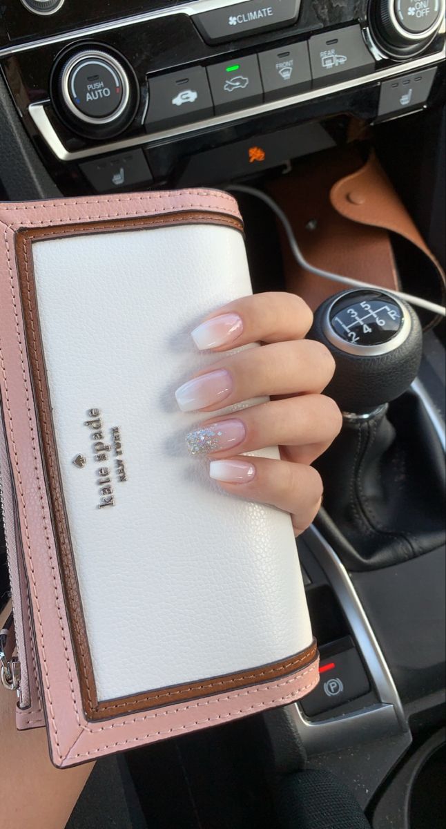 Sophisticated French Manicure with Glitter Accent for Elegant Nail Design