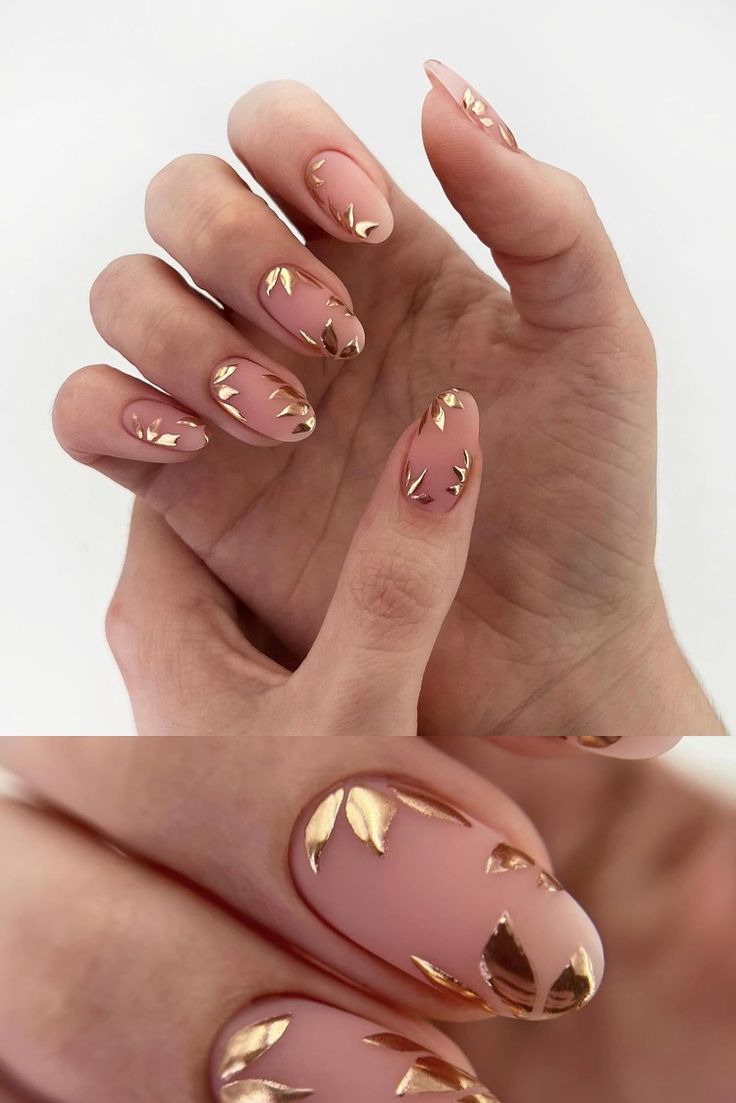 Sophisticated Nude Nail Design with Intricate Gold Leaf Accents