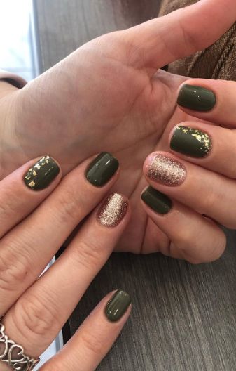 Sophisticated Deep Green Nail Design with Glittery Rose Gold and Gold Foil Accents.