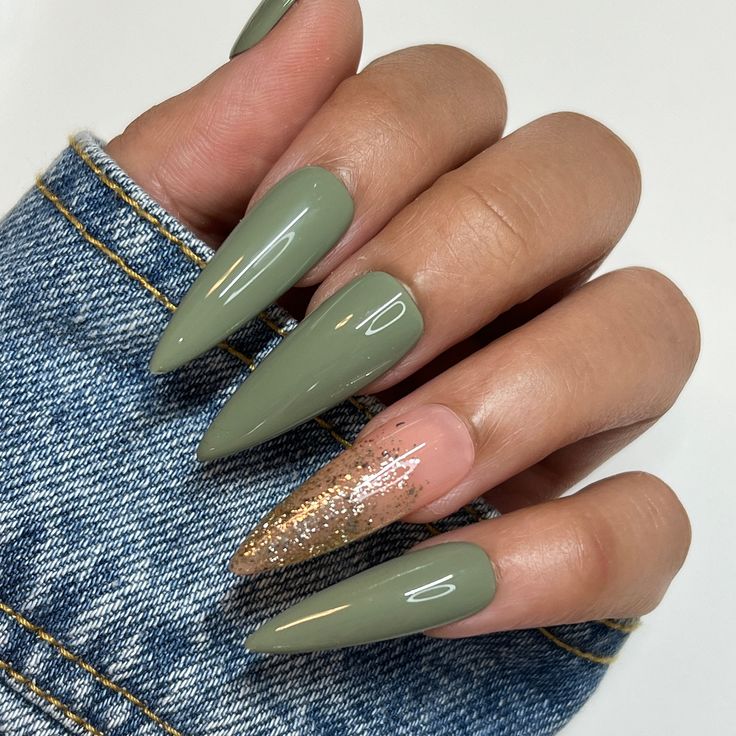 Chic Olive Green Nail Design with Glamorous Gold Glitter Accent.