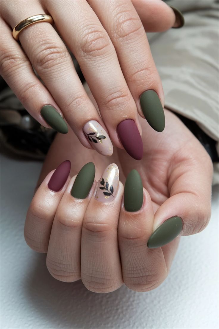 Sophisticated Earthy Tone Nail Design with Botanical Accents and Shimmering Details.