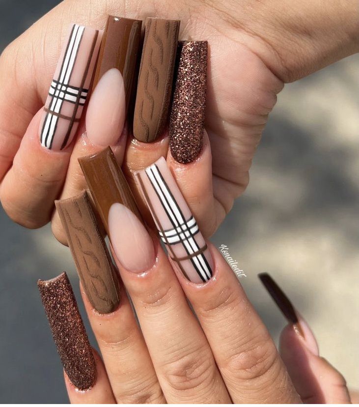 Chic Nail Design with Chocolate Brown and Nude Shades, Enhanced by Patterns and Glitter for a Bold Statement.