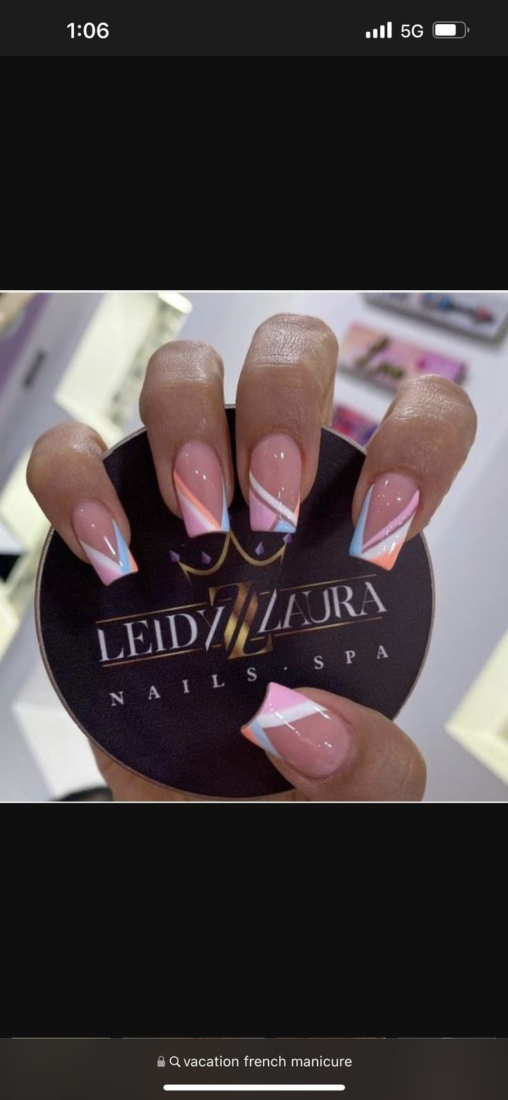 Chic Diagonal French Manicure in Pastel Shades: A Modern and Elegant Seasonal Look.