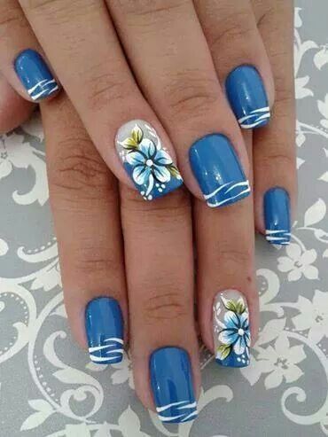 Elegant Floral-Inspired Nail Design with Vibrant Blue Color Scheme and Sophisticated Stripes