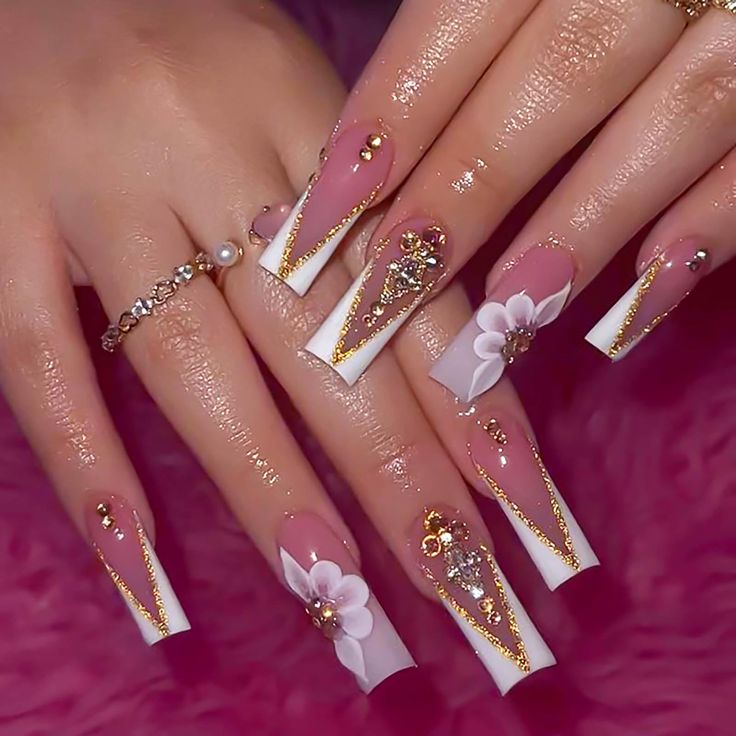 Chic French Tip Long Nails with Floral Accents and Golden Details