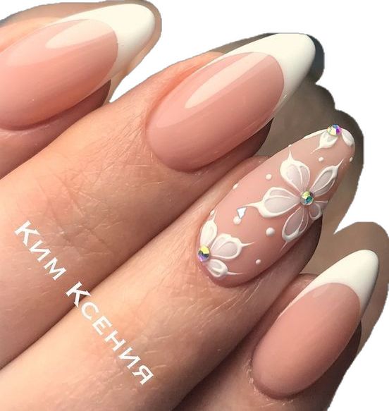 Chic Soft Pink Nail Design with Glossy French Tips and Sparkling Floral Accents.