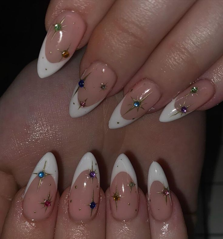 Chic Nude and White Tip Nail Design with Colorful Rhinestones and Golden Accents