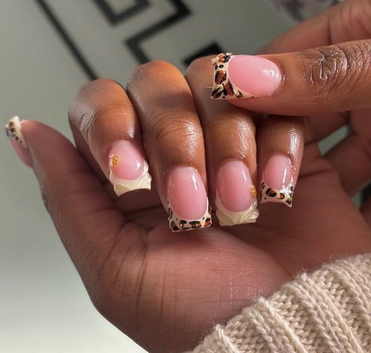 Chic Soft Pink Nail Design with Trendy Animal Print Tips