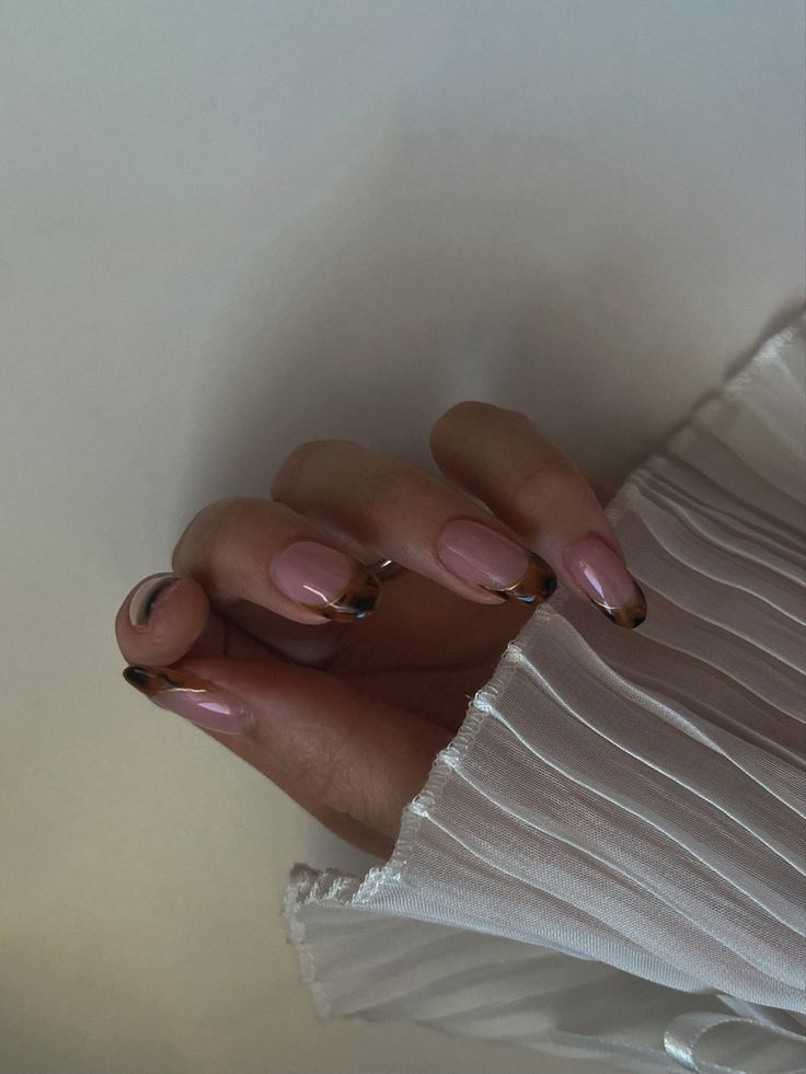 Chic Soft Pink and Black Tips Nail Design for Sophistication and Style.