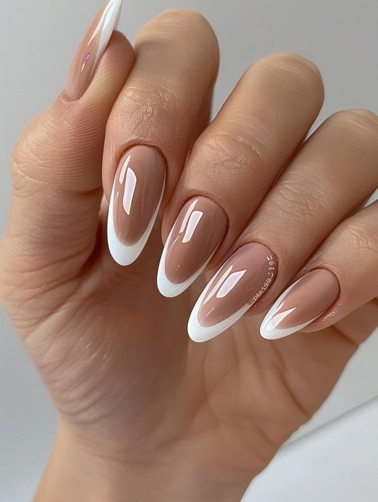 Chic Almond-Shaped French Manicure with Glossy Nude Base and White Tips.