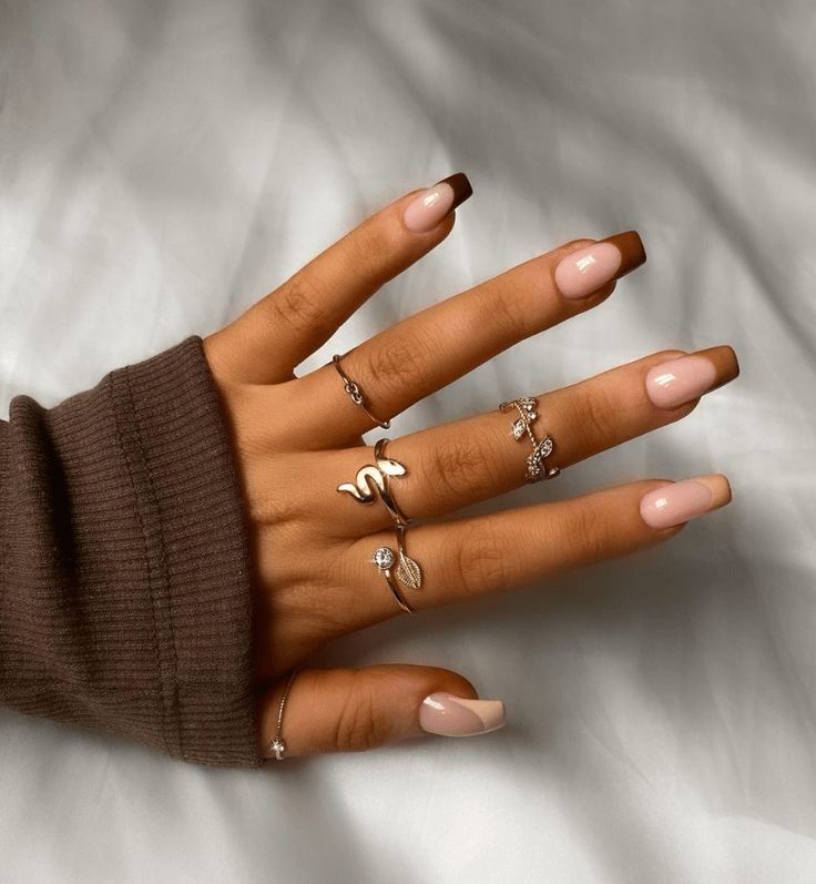 Chic Nude Nail Design with French Tips: A Sophisticated Blend of Elegance and Shine